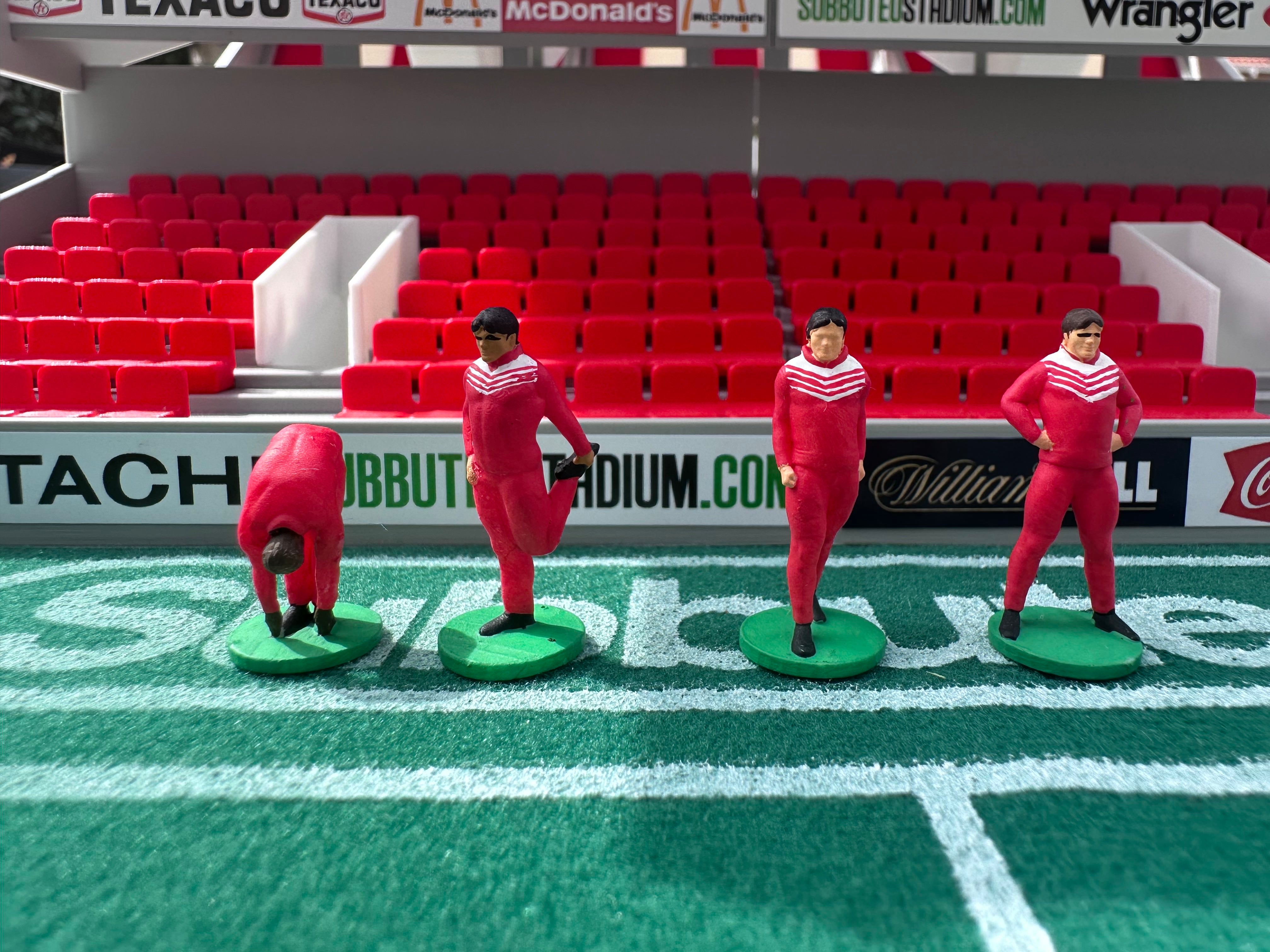 Reserve players warming up – Hand-Painted Subbuteo Accessory (Set of 4)