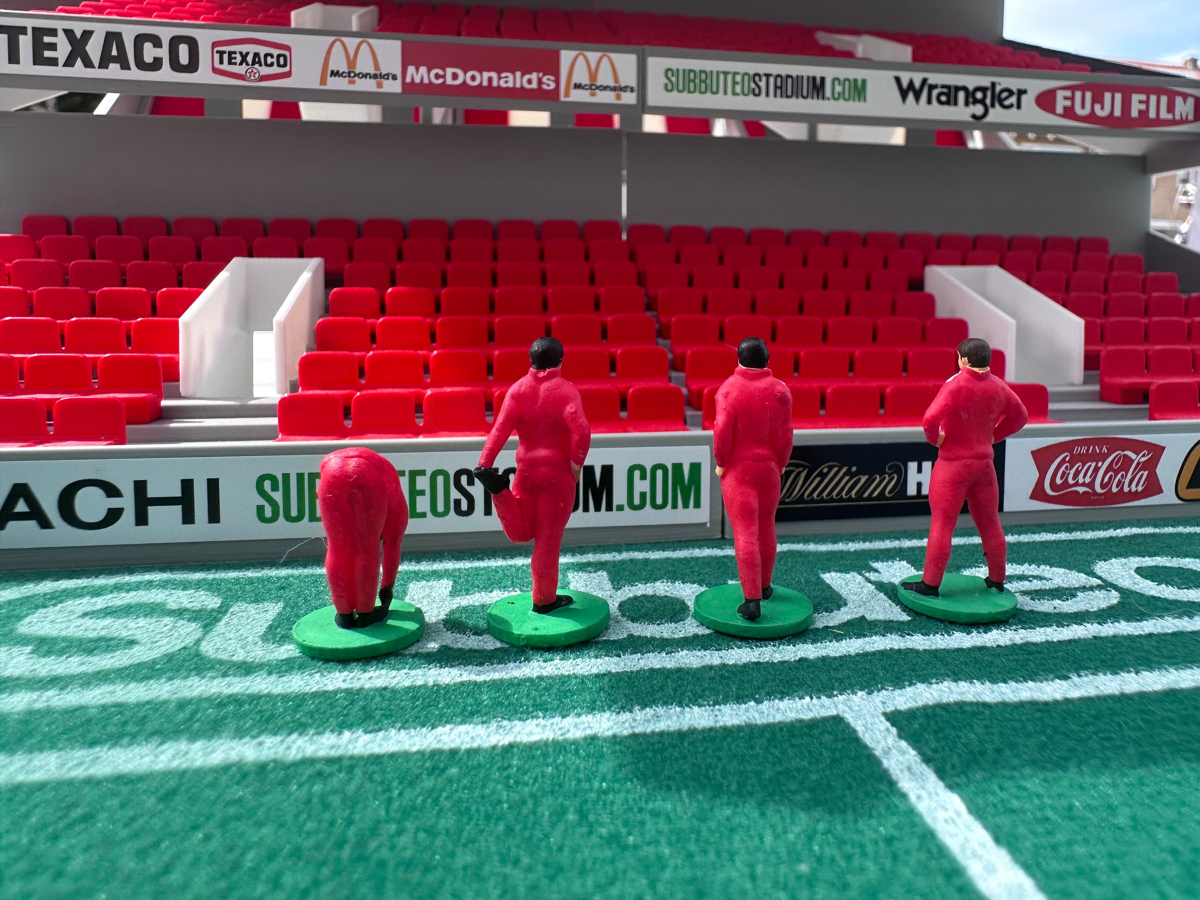 Reserve players warming up – Hand-Painted Subbuteo Accessory (Set of 4)