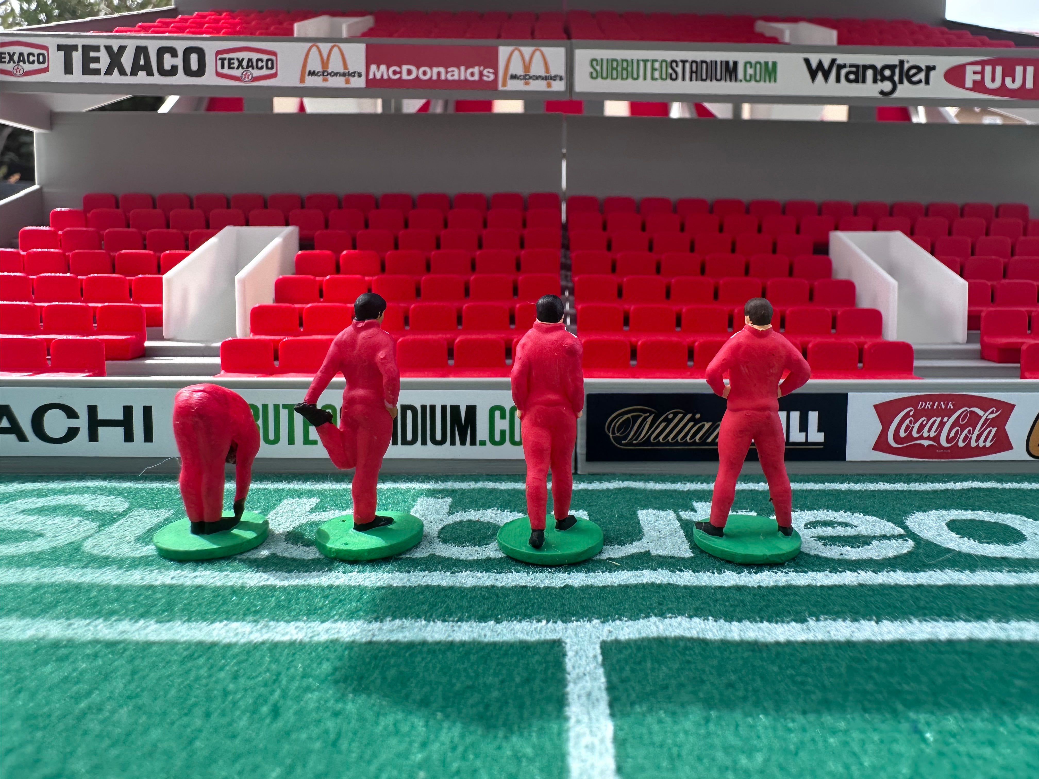 Reserve players warming up – Hand-Painted Subbuteo Accessory (Set of 4)