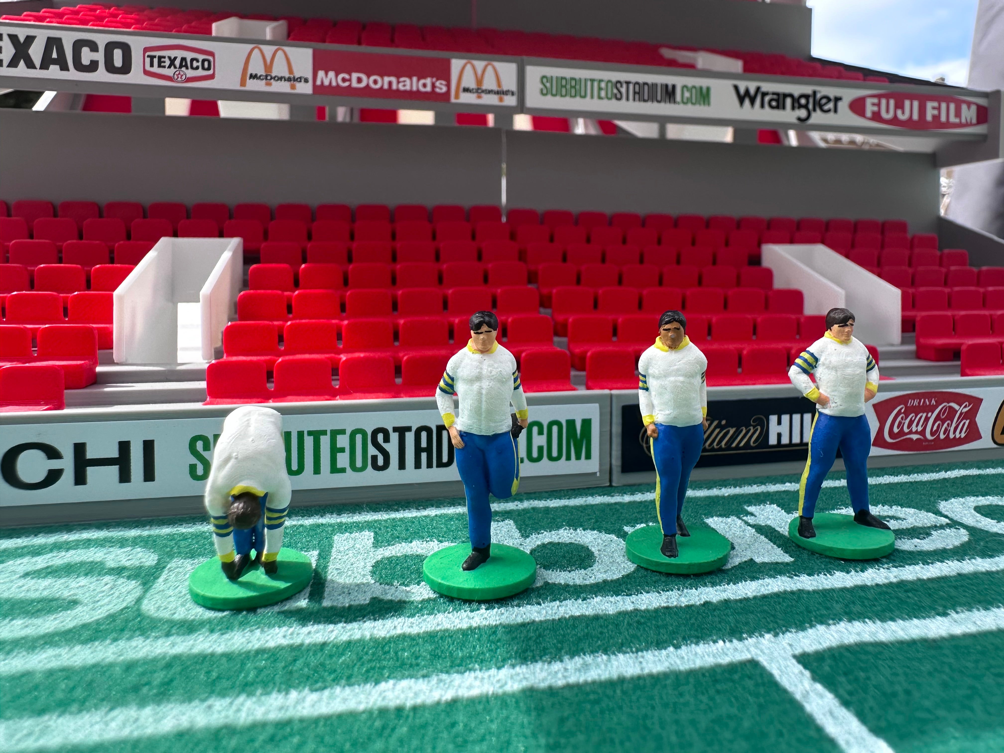 Reserve players warming up – Hand-Painted Subbuteo Accessory (Set of 4)