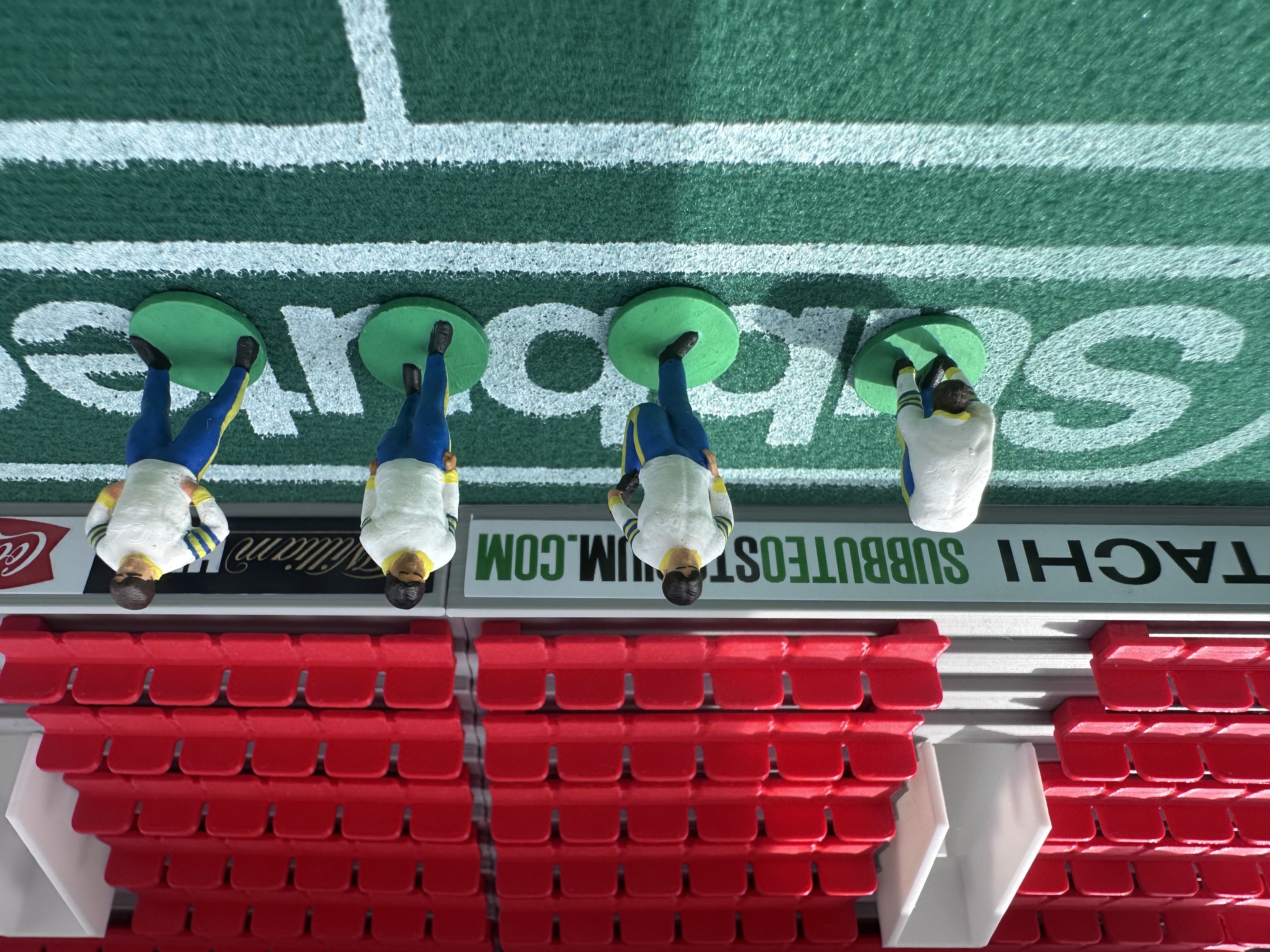 Reserve players warming up – Hand-Painted Subbuteo Accessory (Set of 4)