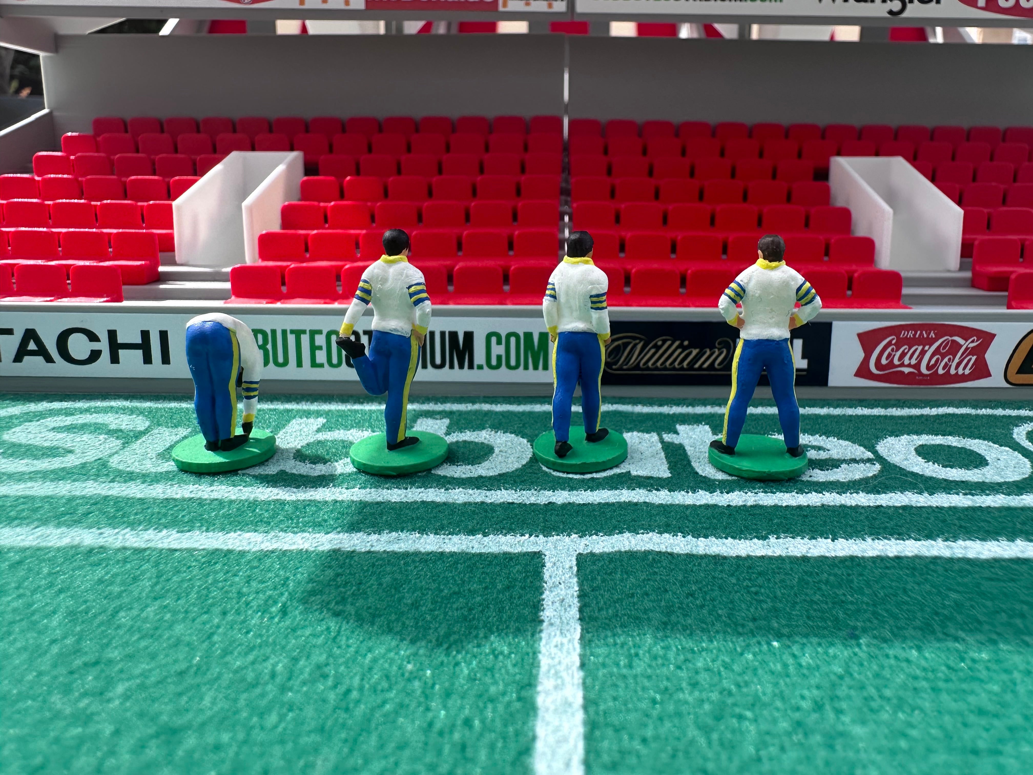 Reserve players warming up – Hand-Painted Subbuteo Accessory (Set of 4)