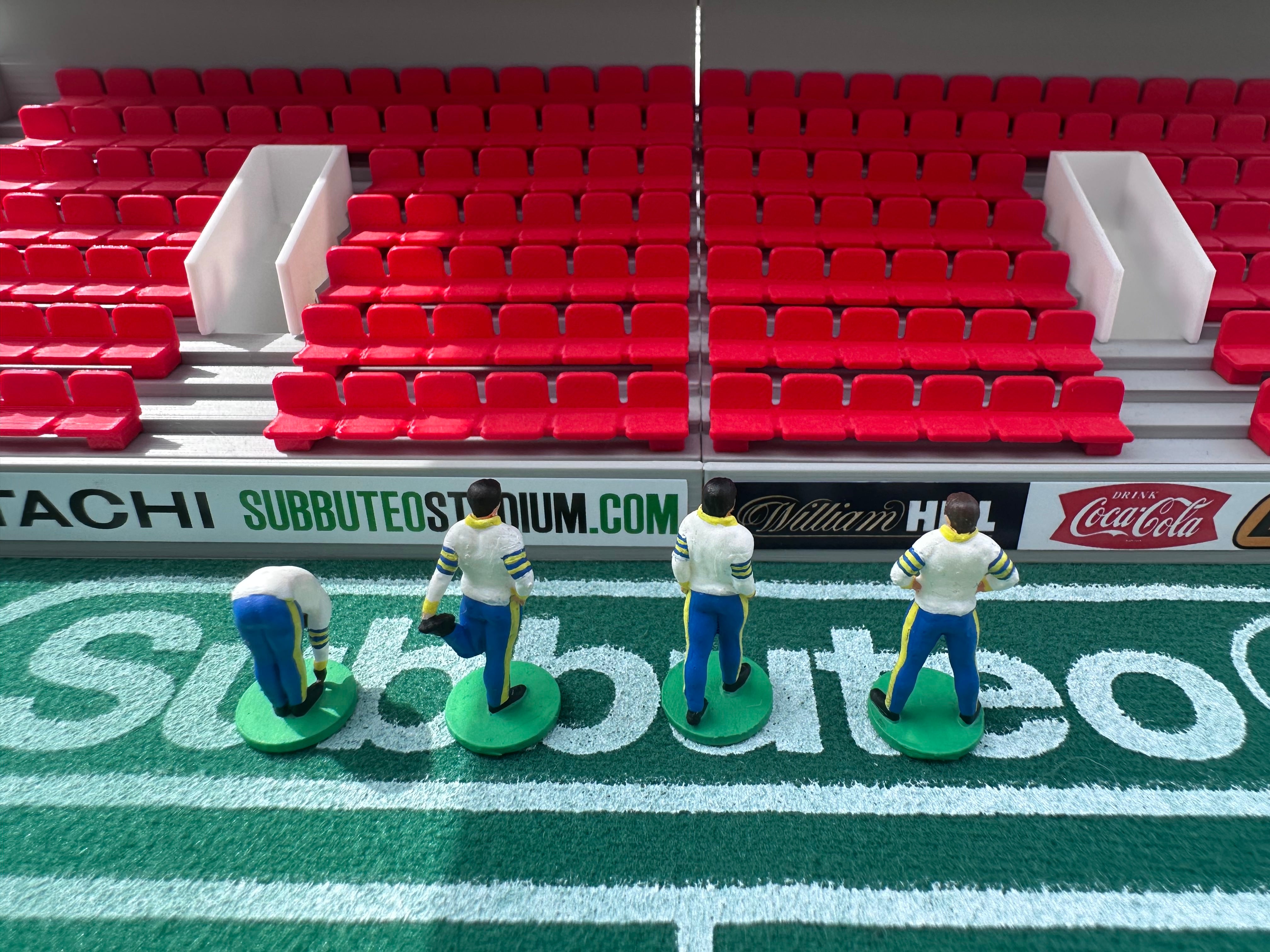 Reserve players warming up – Hand-Painted Subbuteo Accessory (Set of 4)