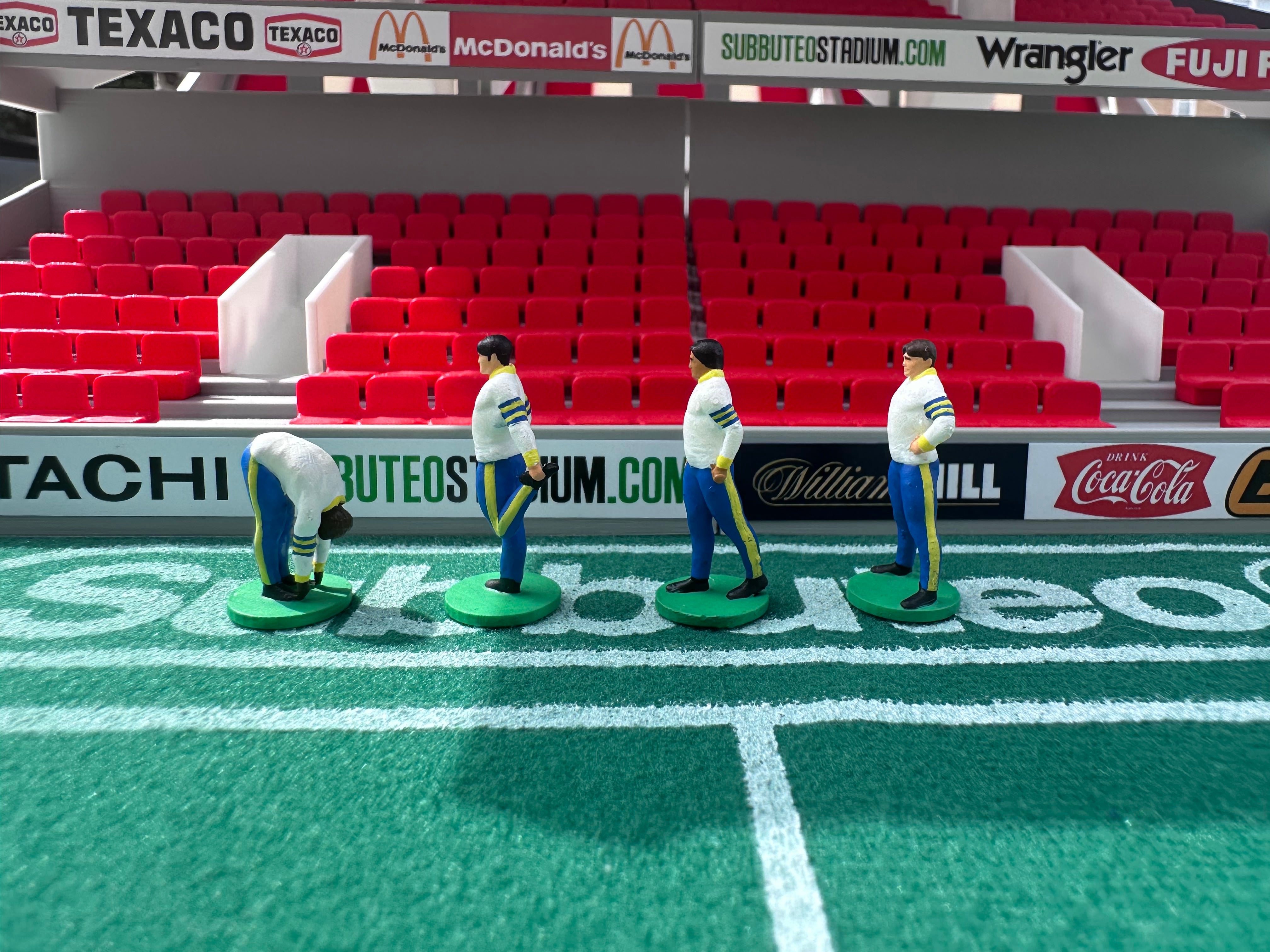 Reserve players warming up – Hand-Painted Subbuteo Accessory (Set of 4)