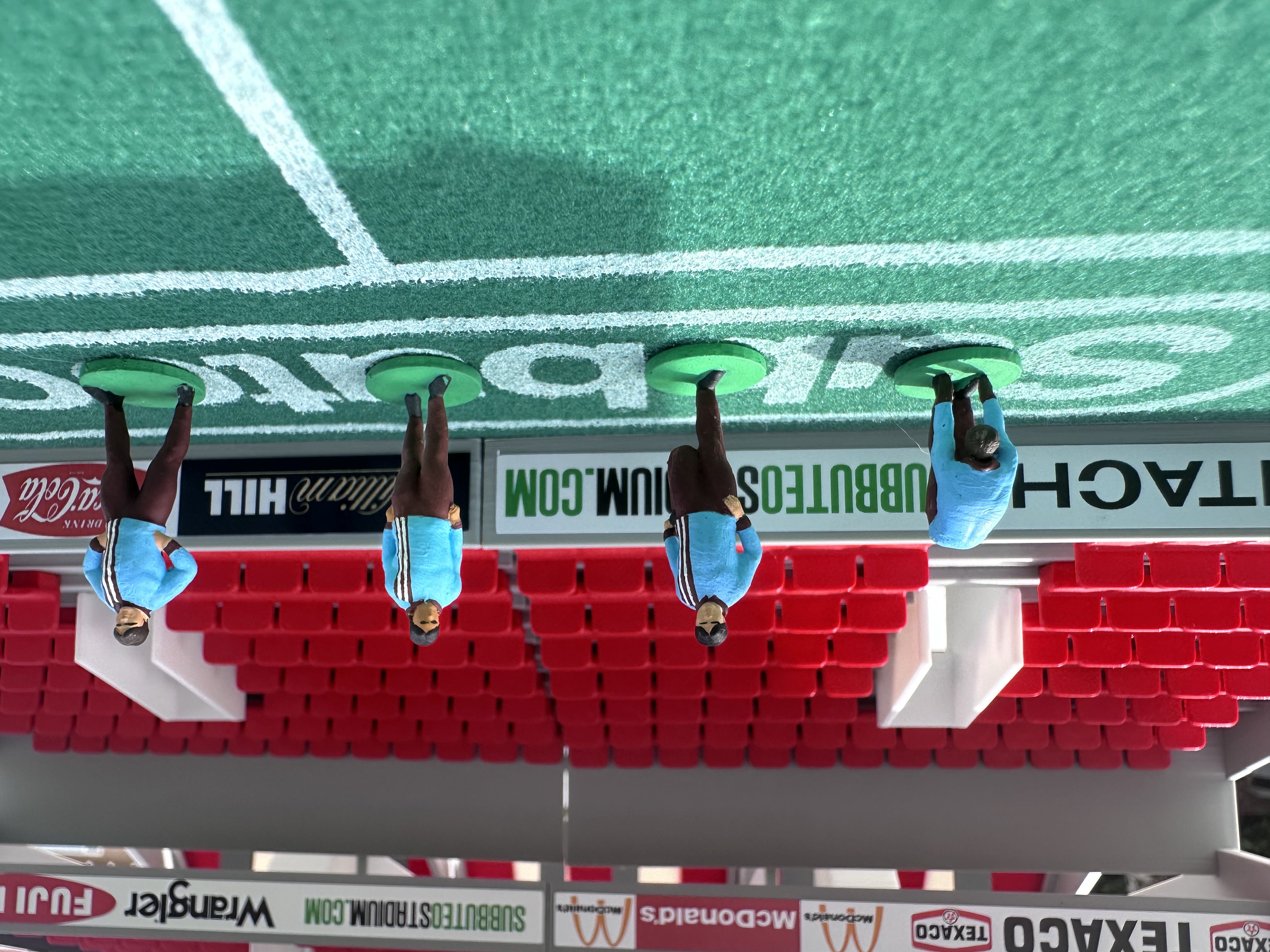 Reserve players warming up – Hand-Painted Subbuteo Accessory (Set of 4)